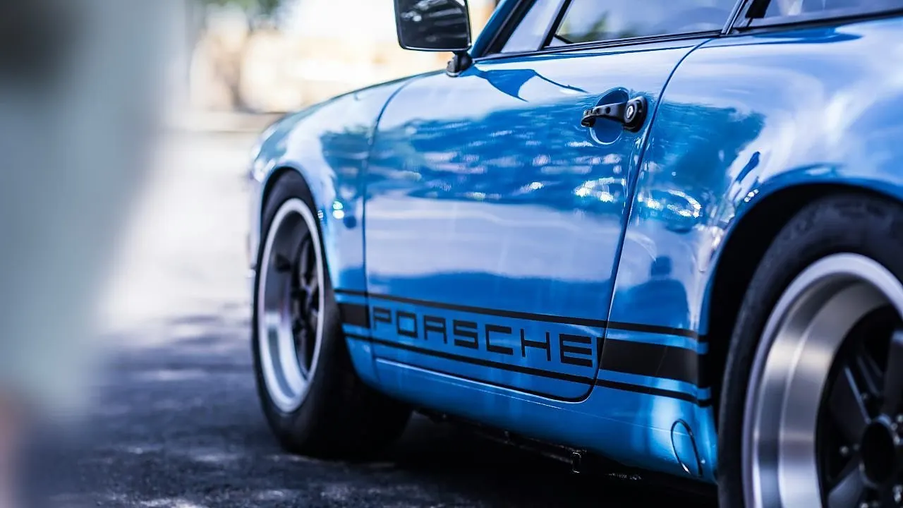 A vintage blue Porsche 911, photographed for the GMS Journal
