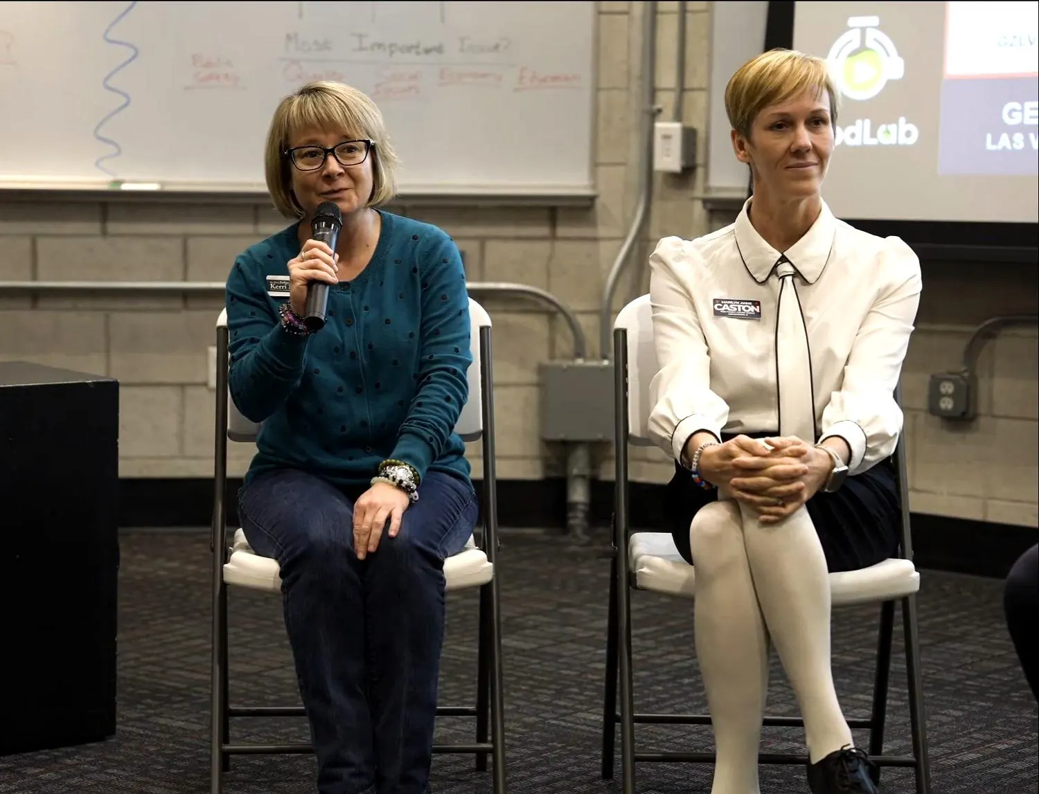 The Family Court panel at Across the Aisle Vol. 5, UNLV · one panelist speaking into a microphone, another seated beside her
